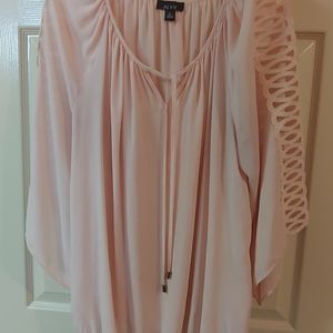 Pink blouse with cutout on arms